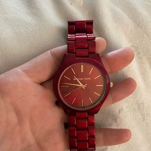 Three Michael Kors watches for sale.